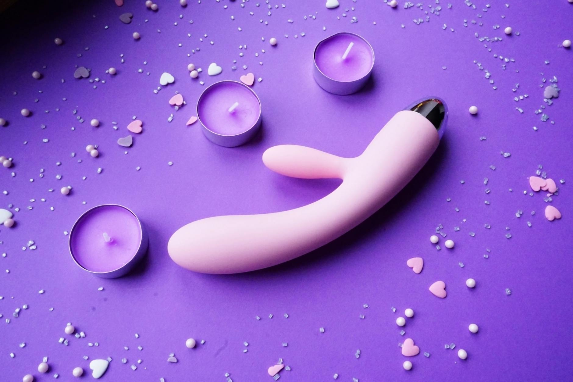 Two bright yellow lemons on a white background, symbolizing the shape and color of lemon clitoral vibrators.